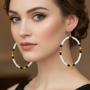 Large, handmade hoop earrings with small glass beads. These multicolored earring